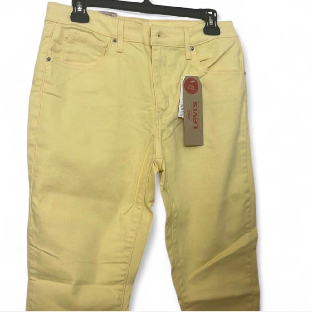 Yellow Levi's 721 ankle length jeans